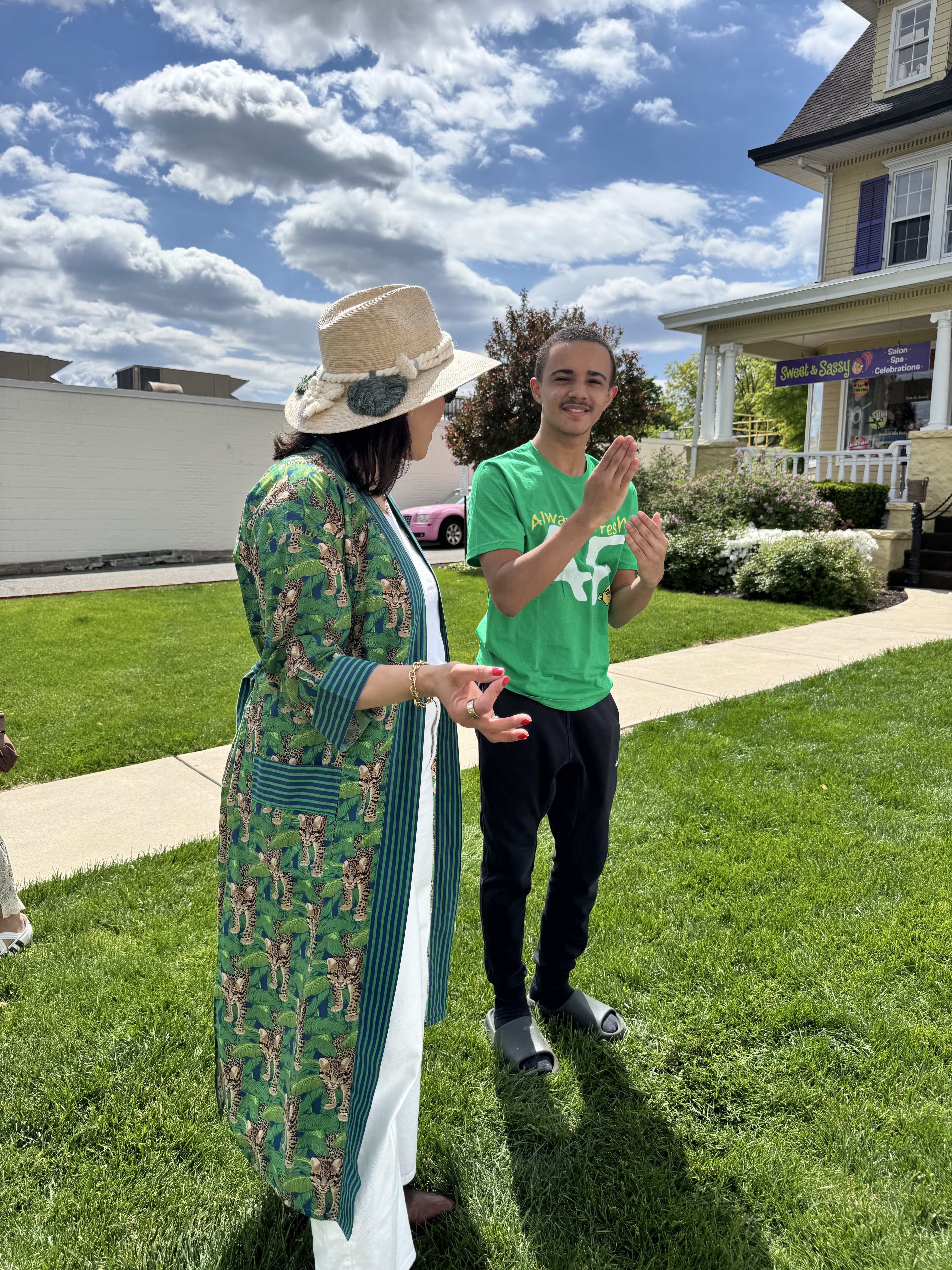 Madden speaking with a community member